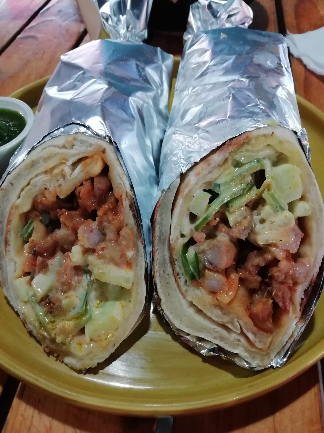 Chicken shawarma over rice with salad